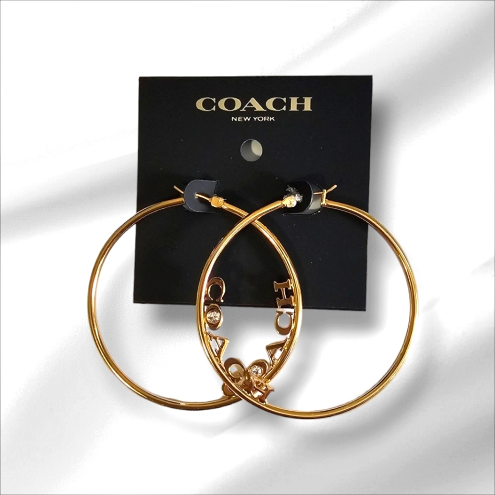 COACH Gold Tone Hoop Earrings and Mini Dust Bag.